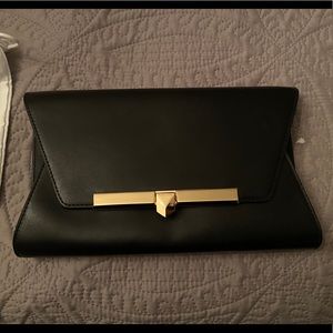 Brand New Michael Kors Leather Clutch